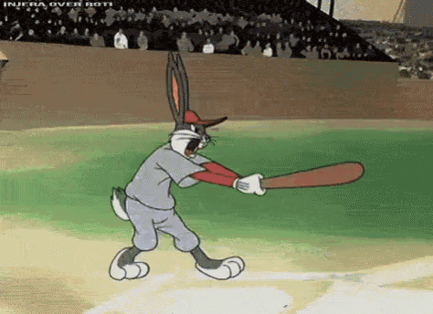 A gif of Bugs Bunny hitting a baseball back at the pitcher.